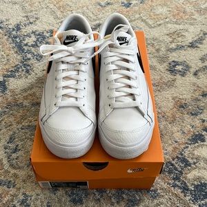 Nike Blazer Low Platform. Women’s size 7.5. White with black swoosh. Like new.
